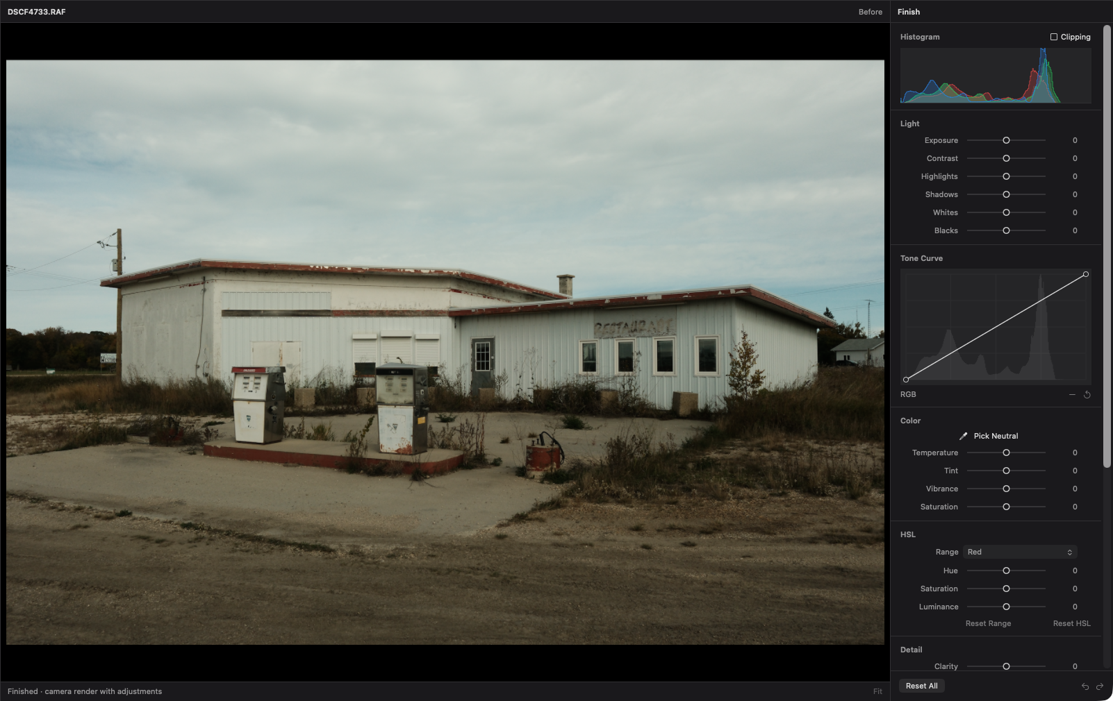 A gas station photo in the Finish workspace beside histogram, light, tone curve, color, and HSL controls.